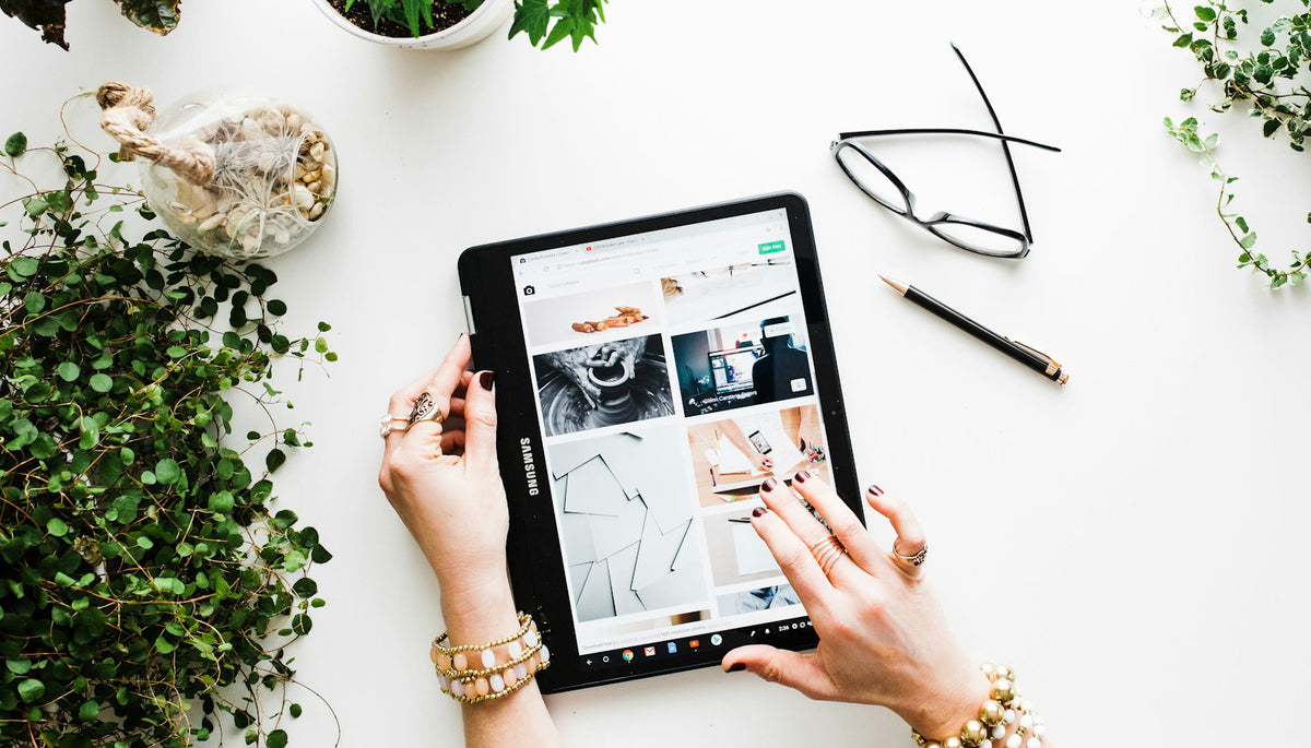 person browsing an online shop on her tablet