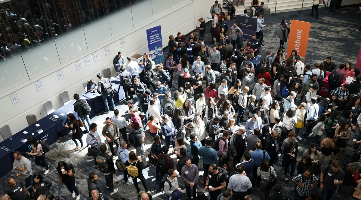crowd of people in a trade show