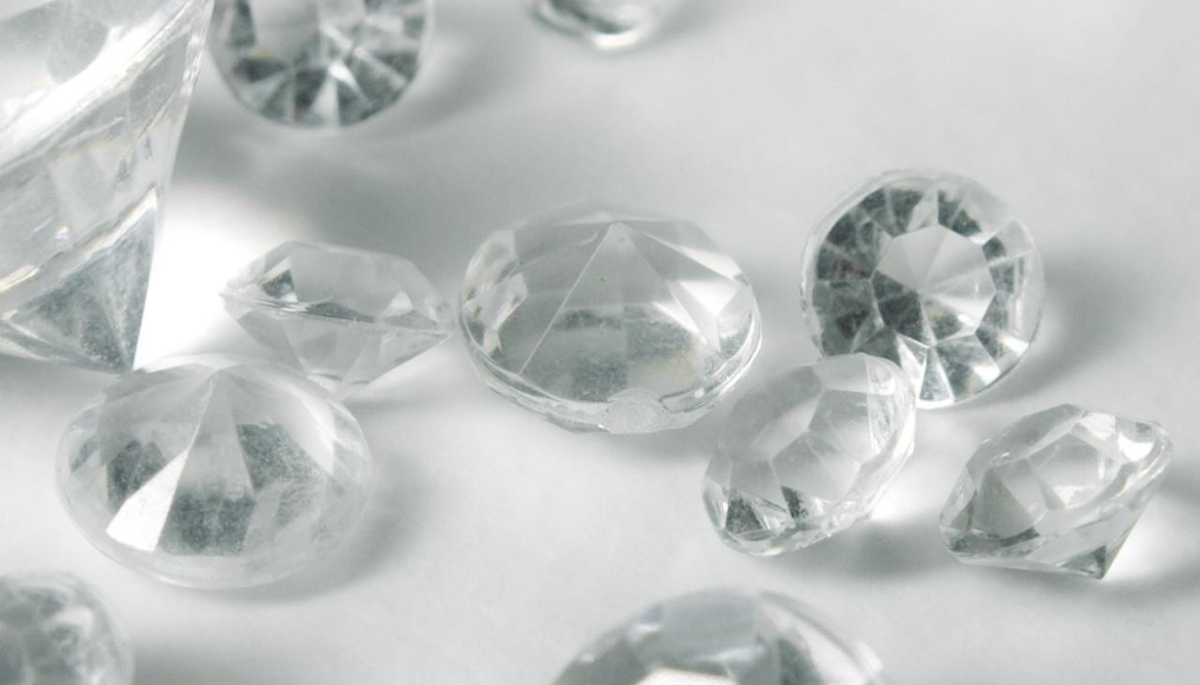 diamonds on a white reflective surface