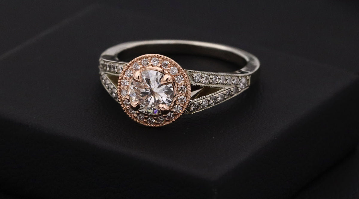 close up photo of a cocktail ring on a black velvet surface