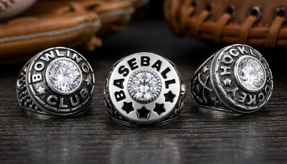 thre Ceri Jewelry sports-designed men's fashion rings on a dark surface