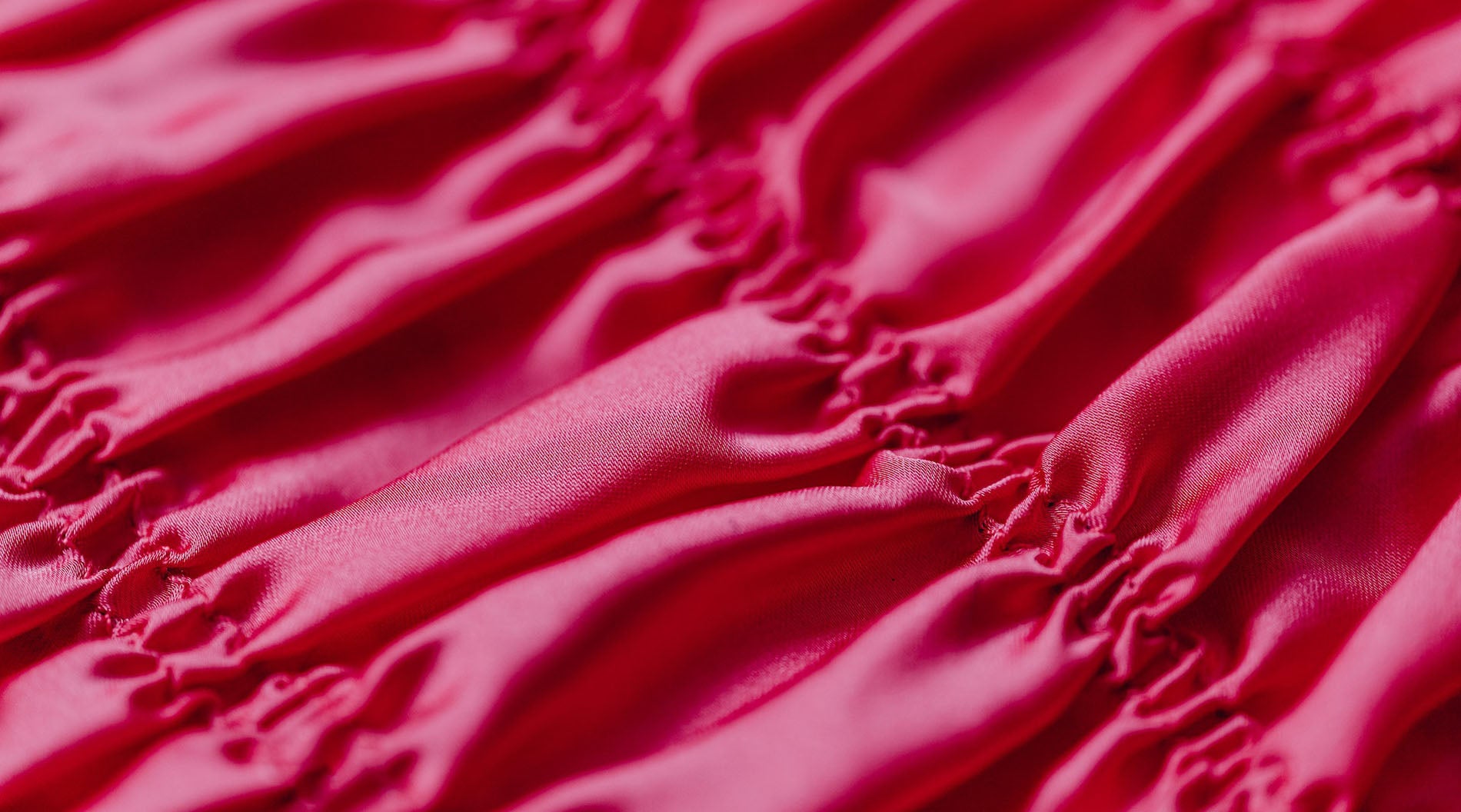 Close-Up Shot of a Magenta Fabric