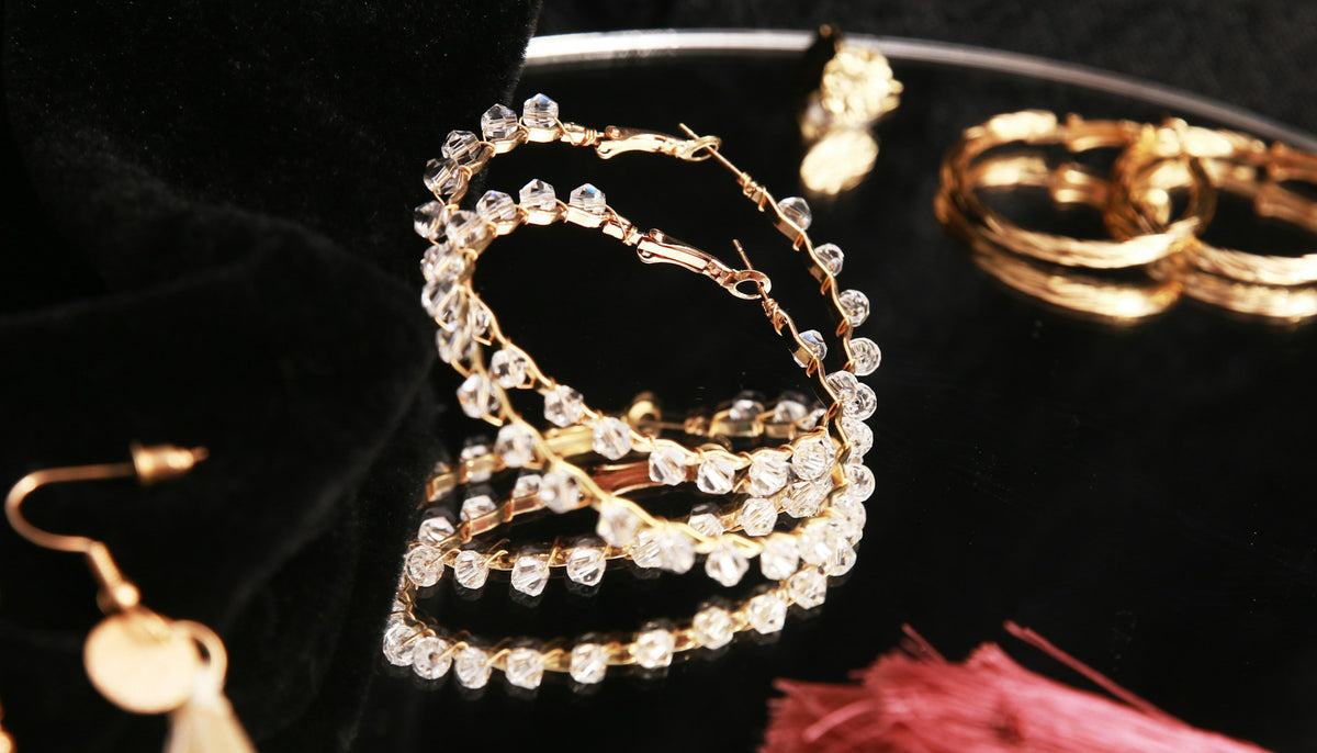 close up of a bracelet with other fashion jewelry in the background