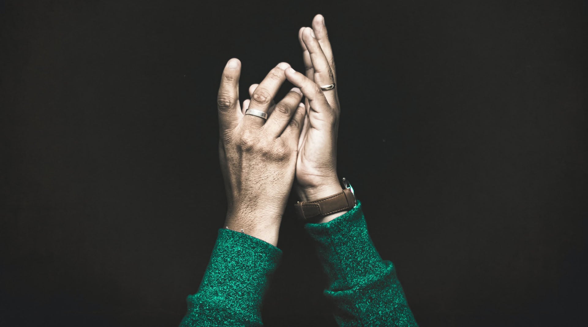 man's hands with fashion rings